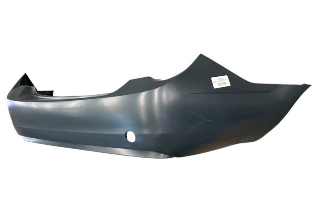 Paragolpe Chevrolet trasero Sonic 4 puertas c/agujro remolque c/primer